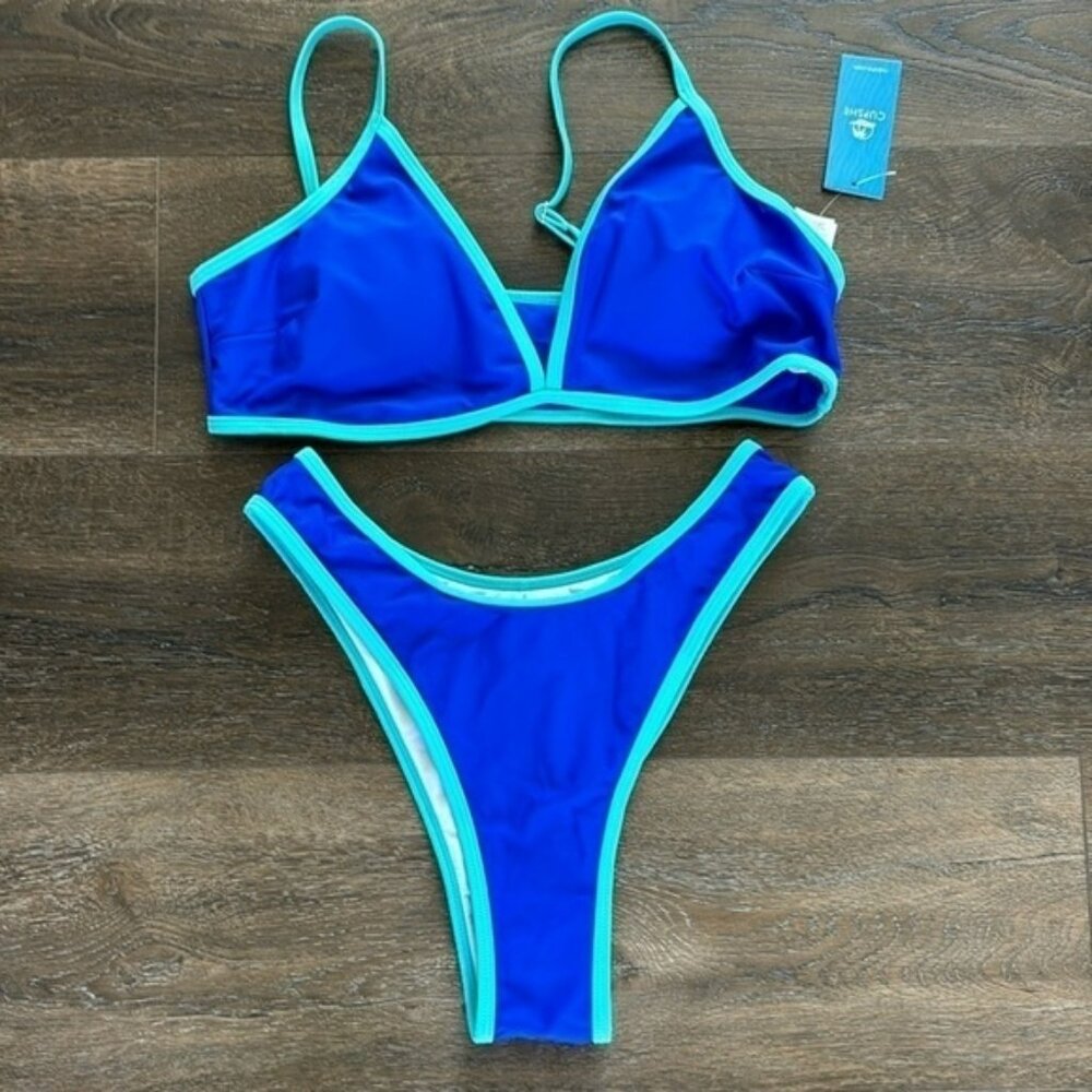 Brand new with tags blue Cupshe Swim Suit.  Size Large.  2 piece swimming suit.